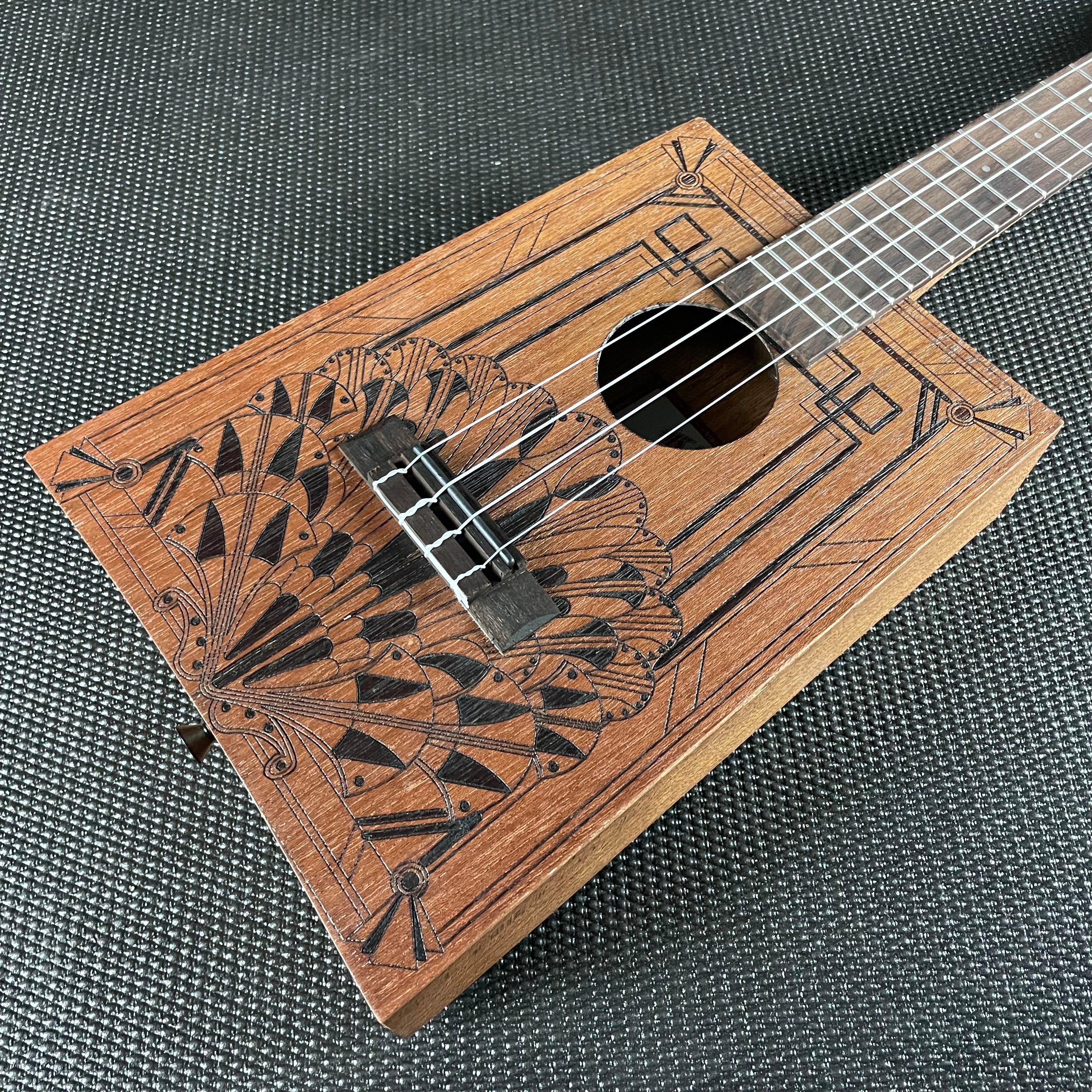 Kala Art Deco Cigar Box Concert Ukulele - Metronome Music Inc.