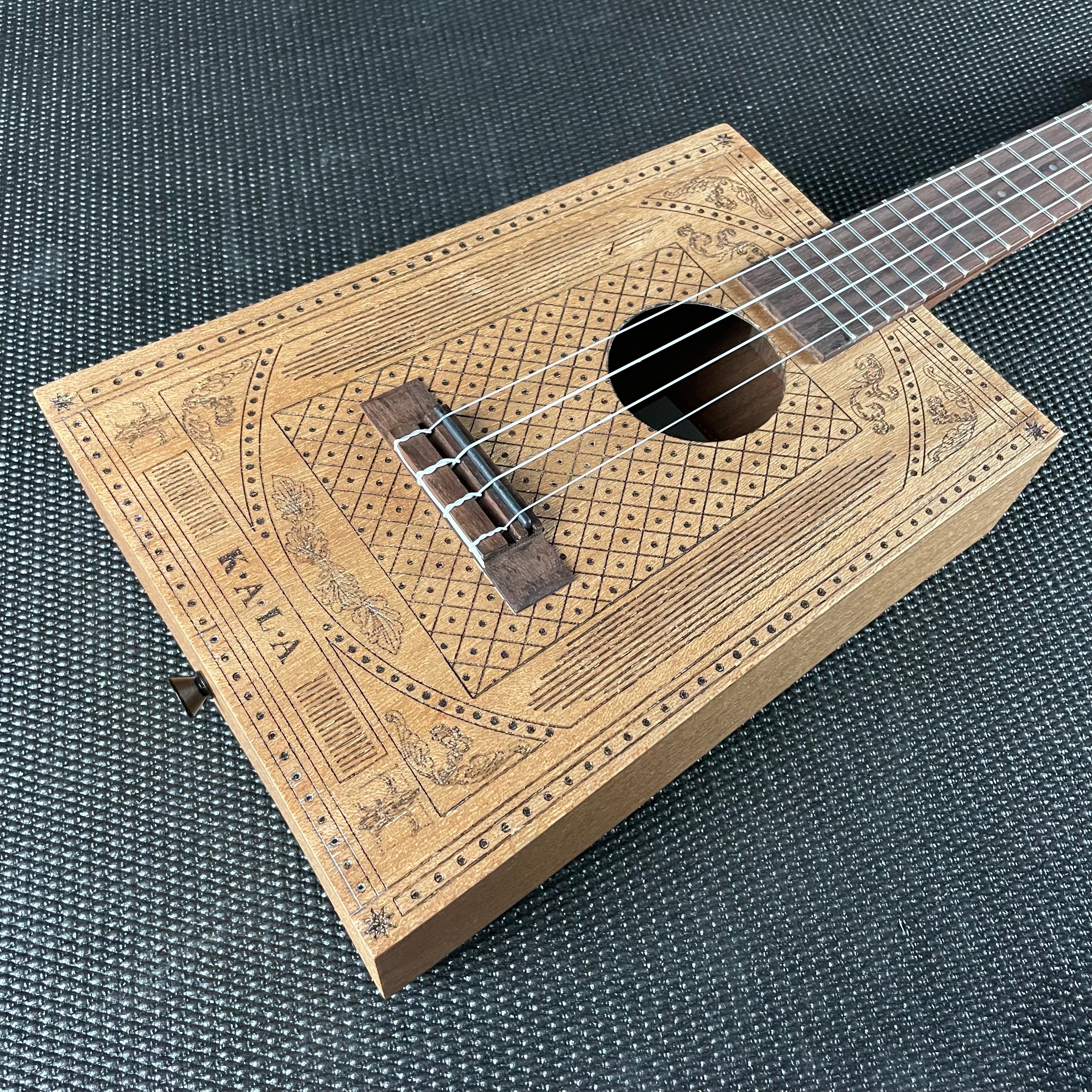 Kala Victorian Cigar Box Concert Ukulele - Metronome Music Inc.